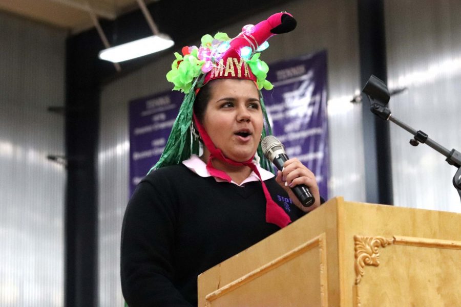 Wearing her own beanie, senior Maya Bair speaks to the crowd about what her beanie symbolizes for her. “It represents the community, friendship, and love I found my freshman year,” Bair said. “I keep it to remember all the memories I’ve made here.”