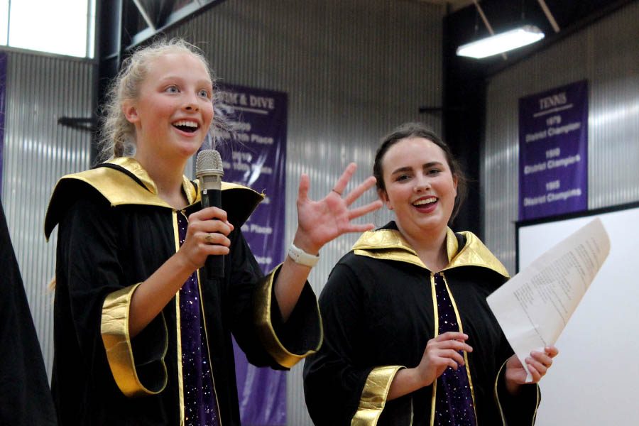 Scream Team leaders Brie Bowes and Allie Dierks teach chants for St. Teresas Academy volleyball game during the pep assembly Sep. 10. 