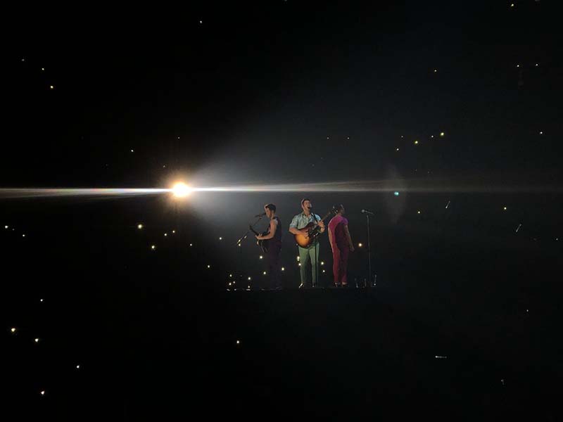 The Jonas Brothers gather together on a rising platform to sing "Hesitate" at Sprint Center Sept. 22.
