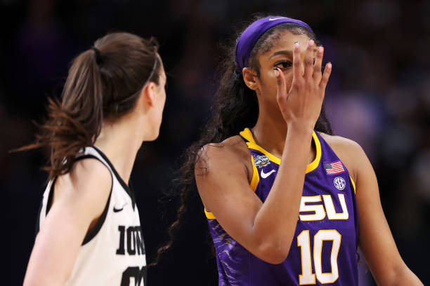 DALLAS, TEXAS - APRIL 02: Angel Reese #10 of the LSU Lady Tigers reacts towards Caitlin Clark #22 of the Iowa Hawkeyes during the fourth quarter during the 2023 NCAA Womens Basketball Tournament championship game at American Airlines Center on April 02, 2023 in Dallas, Texas. (Photo by Maddie Meyer/Getty Images)