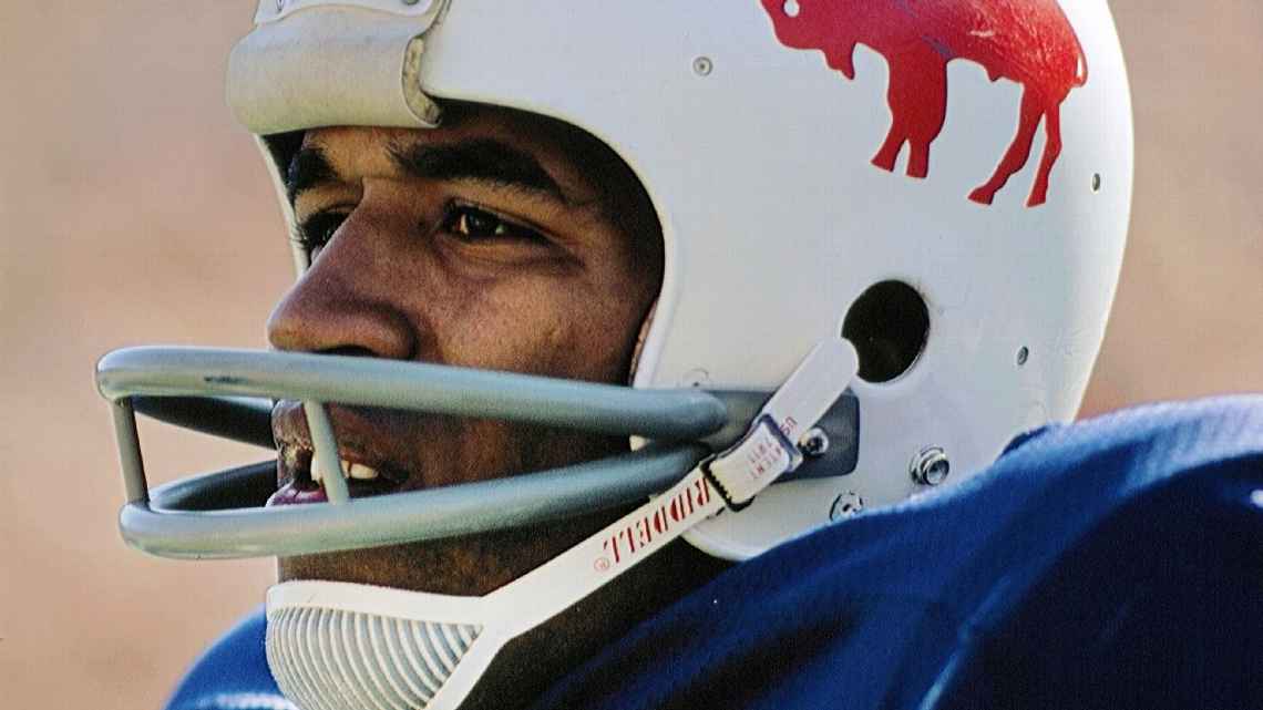 Selected as the No. 1 overall pick by the Buffalo Bills in the 1969 draft, O.J. Simpson's standout season occurred in 1973. During this remarkable year, he made history by becoming the first running back to surpass the 2,000-yard rushing mark in a single season. Simpson's extraordinary achievement included an average of 141.3 yards per game, which remains an NFL record to this day.